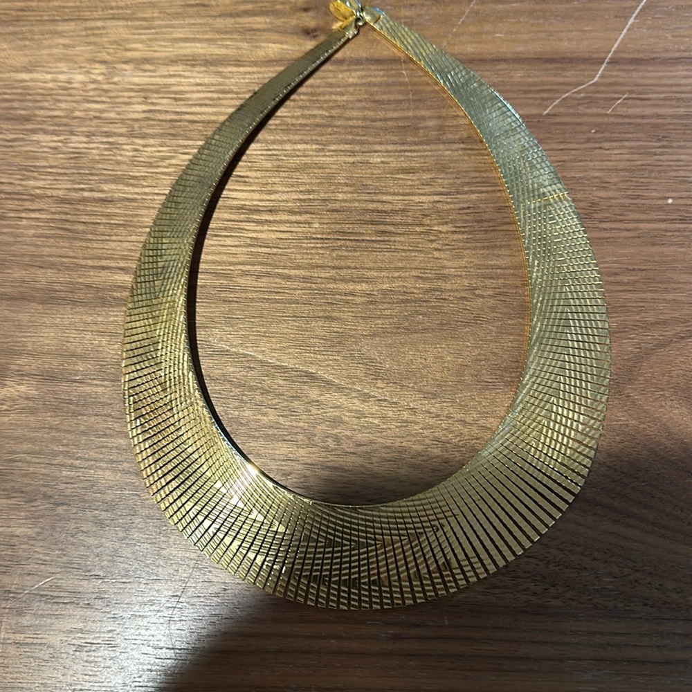 Gold choker.